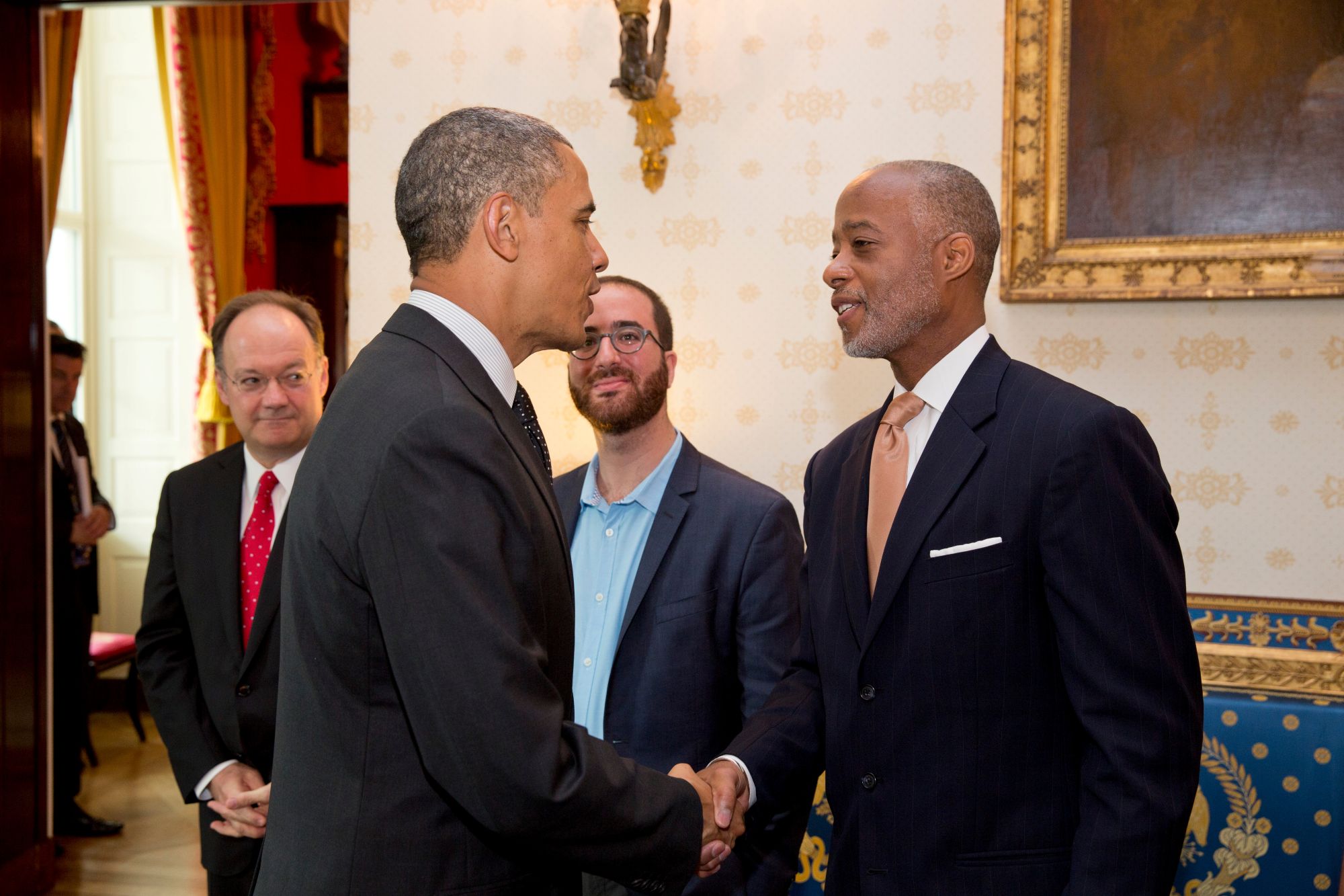 Dr. Norman B. Anderson shaking hands with President Barack Obama at the White House